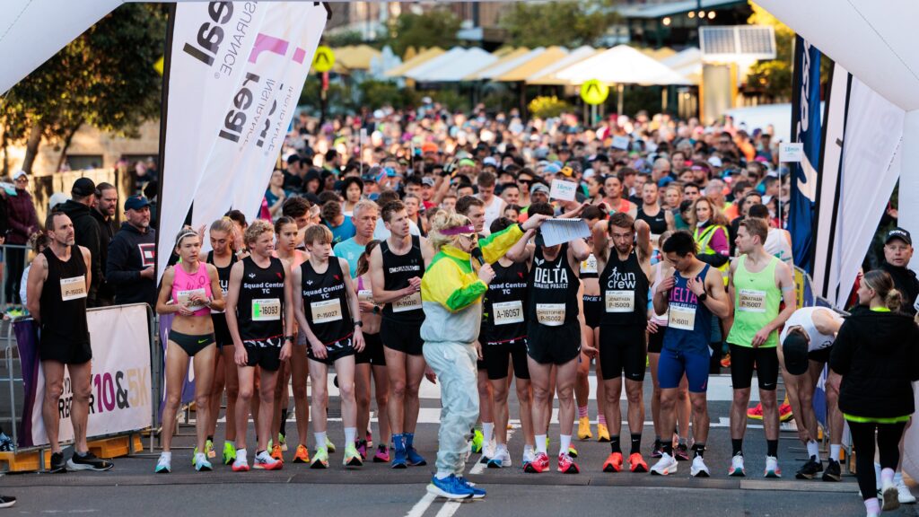 Runners gather at starting line of city marathon