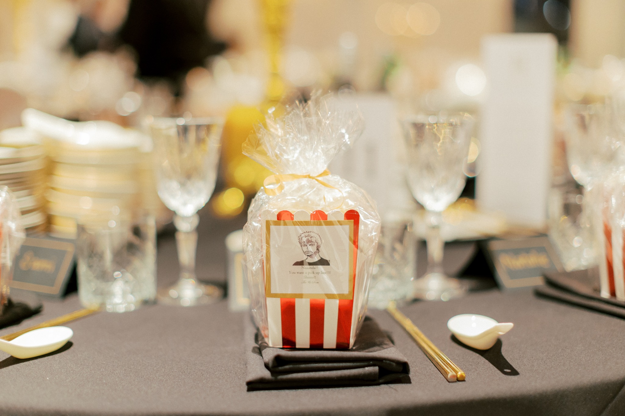 Wrapped striped favour box on decorated dining table